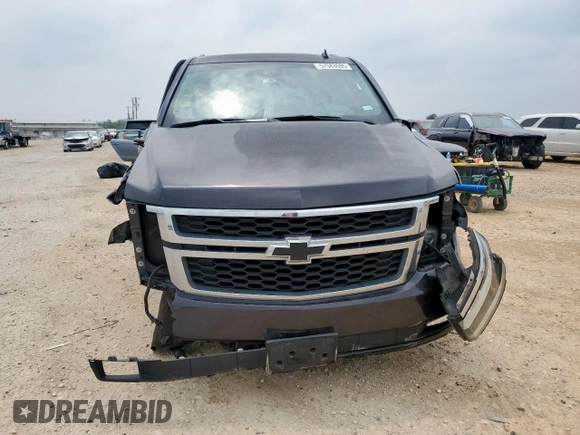 2015 Chevrolet Tahoe LT with VIN 1GNSKBKC1FR139281, listed as a Copart auction lot 57583595 with 142,090 mi miles and Salvage title. Bid and sale history available at DreamBid. Image 5.