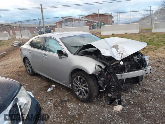 2016 Lexus ES 300h z VIN JTHBW1GGXG2109451, wystawiony jako IAAI lot #41168128 z przebiegiem 101 603 mil mil oraz . Historia ofert i sprzedaży dostępna na DreamBid. Obrazek 13.