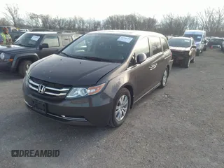 2014 Honda Odyssey EX-L with VIN 5FNRL5H64EB037646, listed as a IAAI auction lot 41786768 with 116,491 mi miles and . Bid and sale history available at carsss.com. Image 2.