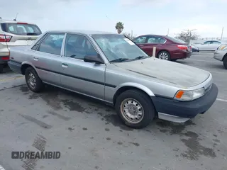 1990 Toyota Camry z VIN 4T1SV24E0LU190211, wystawiony jako IAAI lot #42368986 z przebiegiem 145 167 mil mil oraz . Historia ofert i sprzedaży dostępna na DreamBid. Obrazek 1.