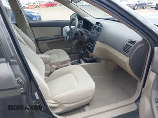 2006 Kia Spectra EX with VIN KNAFE121365346365, listed as a IAAI auction lot 42023727 with 87,345 mi miles and . Bid and sale history available at DreamBid. Image 5.