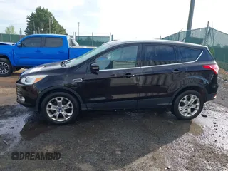 2013 Ford Escape SEL с VIN 1FMCU9HXXDUD49555, выставлен на аукционе IAAI как лот 42042351 с пробегом 124 671 миль миль и . История ставок и продаж доступна на DreamBid. Изображение 14.