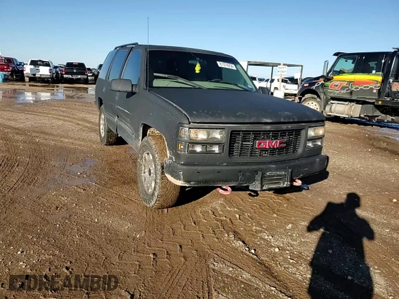 1997 GMC Yukon with VIN 1GKEK13R0VJ710179, listed as a Copart auction lot 81374234 with 186,257 mi miles and Salvage Title. Bid and sale history available at carsss.com. Image 12.