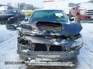 2016 Subaru WRX Premium with VIN JF1VA1E69G9808994, listed as a IAAI auction lot 41328870 with 116,411 mi miles. Bid and sale history available at carsss.com. Image 6.