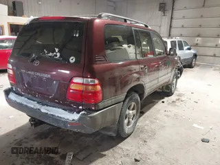 2000 Toyota Land Cruiser with VIN JT3HT05J2Y0102508, listed as a IAAI auction lot 41596418 with 271,327 mi miles. Bid and sale history available at carsss.com. Image 4.
