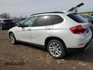 2015 BMW X1 xDrive28i with VIN WBAVL1C58FVY28445, listed as a Copart auction lot 49148015 with 144,319 mi miles and Clean Title. Bid and sale history available at carsss.com. Image 2.