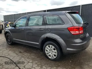 2014 Dodge Journey American Value with VIN 3C4PDCAB1ET135504, listed as a Copart auction lot 58803645 with 164,501 mi miles and Clean title. Bid and sale history available at DreamBid. Image 2.