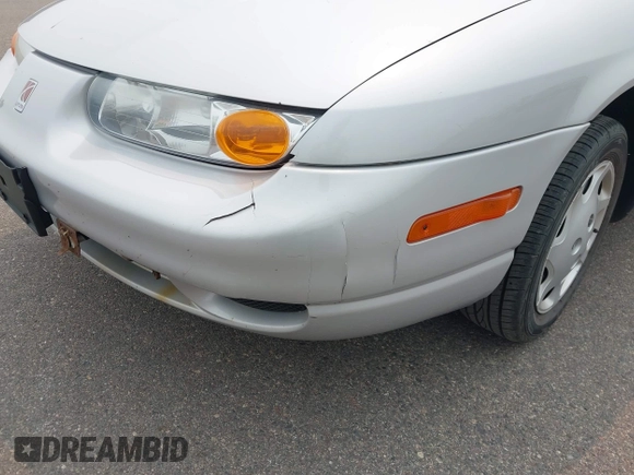 2001 Saturn SL z VIN 1G8ZH52861Z320057, wystawiony jako IAAI lot #42402681 z przebiegiem 111 375 mil mil oraz . Historia ofert i sprzedaży dostępna na DreamBid. Obrazek 6.