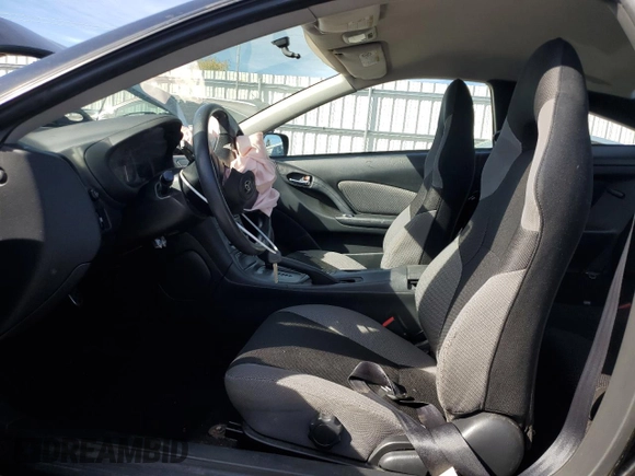 2004 Toyota Celica GT with VIN JTDDR32T140180241, listed as a Copart auction lot 77031284 with 194,669 mi miles and Clean Title. Bid and sale history available at DreamBid. Image 7.