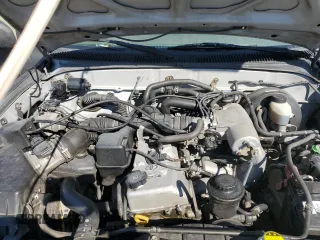 2003 Toyota Tacoma PreRunner z VIN 5TEGM92N43Z281269, wystawiony jako Copart lot #77200284 z przebiegiem 279 039 mil mil oraz Szkoda całkowita • Salvage title. Historia ofert i sprzedaży dostępna na DreamBid. Obrazek 11.