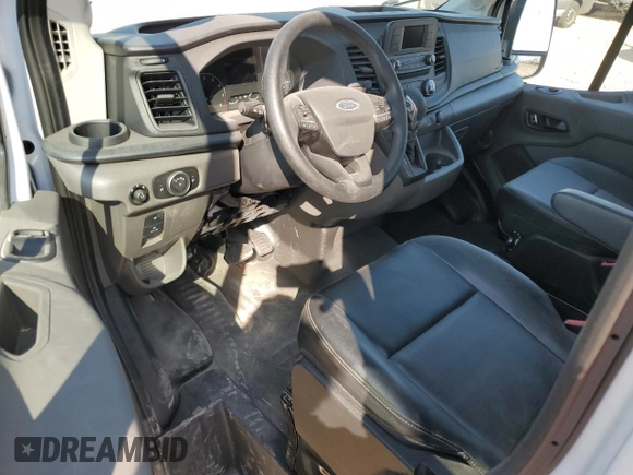 2024 Ford Transit Cargo with VIN 1FTBR1C8XRKA85811, listed as a Copart auction lot 74528914 with 1,725 mi miles and Salvage Title. Bid and sale history available at DreamBid. Image 8.