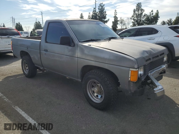 1987 Nissan Hardbody E z VIN JN6ND11SXHW014073, wystawiony jako Copart lot #78956934 z przebiegiem 381 885 mil mil oraz Szkody całkowita. Historia ofert i sprzedaży dostępna na DreamBid. Obrazek 4.