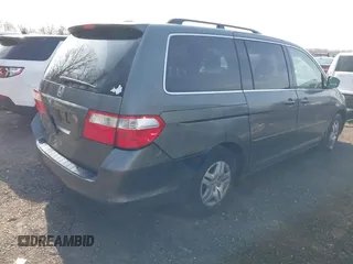 2007 Honda Odyssey EX-L z VIN 5FNRL38717B070328, wystawiony jako IAAI lot #41696829 z przebiegiem 171 229 mil mil oraz . Historia ofert i sprzedaży dostępna na DreamBid. Obrazek 4.