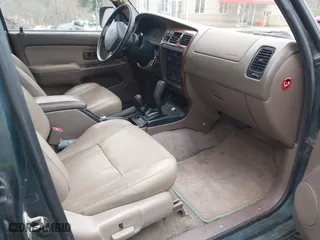 1997 Toyota 4Runner Limited with VIN JT3HN87R1V0078046, listed as a IAAI auction lot 42030550 with 163,683 mi miles. Bid and sale history available at carsss.com. Image 5.