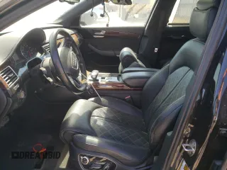 2013 Audi A8 3.0L with VIN WAURGAFD9DN004556, listed as a Copart auction lot 65018975 with 138,090 mi miles and Salvage title. Bid and sale history available at DreamBid. Image 7.