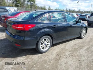 2016 Ford Focus SE with VIN 1FADP3F24GL248175, listed as a IAAI auction lot 41867019 with 135,471 mi miles. Bid and sale history available at carsss.com. Image 4.