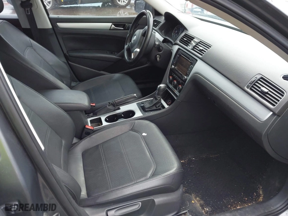2013 Volkswagen Passat SE w/Sunroof with VIN 1VWBH7A38DC002096, listed as a IAAI auction lot 41904594 with 134,738 mi miles. Bid and sale history available at carsss.com. Image 5.
