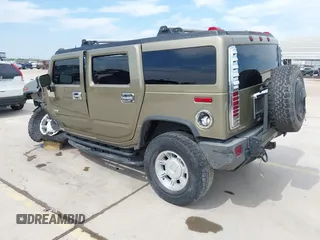 2006 Hummer H2 with VIN 5GRGN23U56H102574, listed as a IAAI auction lot 41955539 with 202,102 mi miles. Bid and sale history available at carsss.com. Image 3.