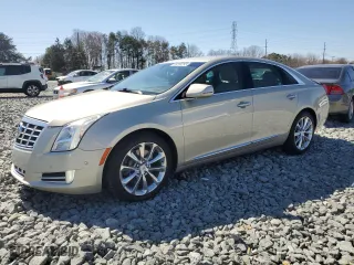 2014 Cadillac XTS Luxury with VIN 2G61M5S30E9118577, listed as a Copart auction lot 48314295 with 106,152 mi miles and Salvage Title. Bid and sale history available at carsss.com. Image 1.