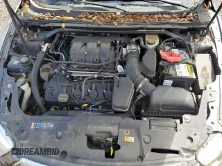 2015 Ford Taurus SE with VIN 1FAHP2D87FG127490, listed as a Copart auction lot 55993945 with 127,101 mi miles and Clean Title. Bid and sale history available at DreamBid. Image 11.