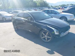 2013 Cadillac ATS z VIN 1G6AA5RA6D0113499, wystawiony jako IAAI lot #42373527 z przebiegiem 204 882 mil mil oraz . Historia ofert i sprzedaży dostępna na DreamBid. Obrazek 1.