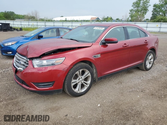 2015 Ford Taurus SEL with VIN 1FAHP2E88FG166961, listed as a Copart auction lot 61429255 with 124,780 mi miles and Salvage title. Bid and sale history available at DreamBid. Image 1.