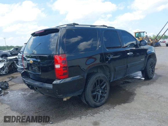 2013 Chevrolet Tahoe LT with VIN 1GNSCBE00DR337071, listed as a IAAI auction lot 42282457 with 151,460 mi miles and . Bid and sale history available at DreamBid. Image 4.