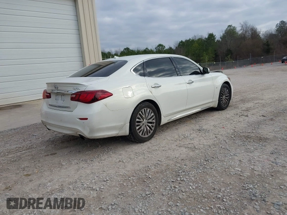 2015 Infiniti Q70 with VIN JN1BY1PP5FM601628, listed as a IAAI auction lot 41510075 with 102,363 mi miles and . Bid and sale history available at DreamBid. Image 4.