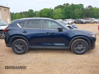 2020 Mazda CX-5 Touring with VIN JM3KFBCM9L0741535, listed as a IAAI auction lot 42101763 with 54,004 mi miles and . Bid and sale history available at DreamBid. Image 13.