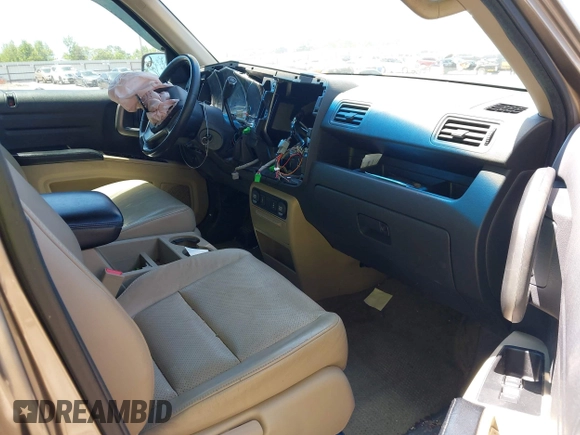 2011 Honda Ridgeline RTL with VIN 5FPYK1F57BB452321, listed as a IAAI auction lot 42306915 with Not provided miles and . Bid and sale history available at DreamBid. Image 5.