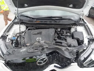 2015 Mazda CX-5 Touring with VIN JM3KE2CY3F0550624, listed as a IAAI auction lot 41931268 with 51,588 mi miles and . Bid and sale history available at carsss.com. Image 10.