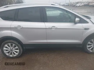 2017 Ford Escape Titanium with VIN 1FMCU0J96HUC21987, listed as a IAAI auction lot 41971376 with 97,488 mi miles and . Bid and sale history available at DreamBid. Image 13.
