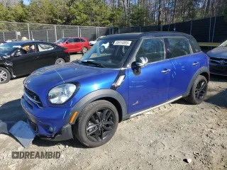 2016 MINI Countryman S with VIN WMWZC5C56GWP49392, listed as a Copart auction lot 50414005 with 90,472 mi miles and Salvage Title. Bid and sale history available at DreamBid. Image 1.