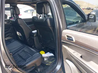 2014 Jeep Grand Cherokee Limited with VIN 1C4RJFBG1EC325215, listed as a IAAI auction lot 42653200 with 139,743 mi miles and . Bid and sale history available at DreamBid. Image 8.