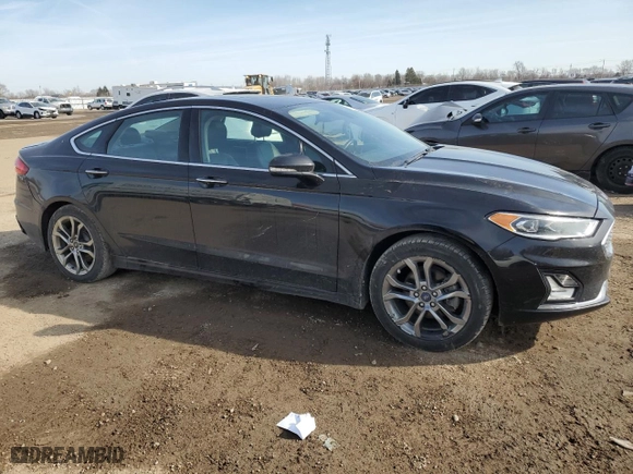 2020 Ford Fusion Hybrid Titanium with VIN 3FA6P0RU3LR182217, listed as a Copart auction lot 49069455 with 133,529 mi miles and Salvage Title. Bid and sale history available at carsss.com. Image 4.