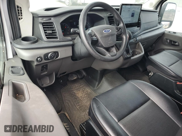 2023 Ford Transit Cargo z VIN 1FTYE1C89PKA17390, wystawiony jako Copart lot #83939214 z przebiegiem 76 099 mil mil oraz Szkoda całkowita • Salvage title. Historia ofert i sprzedaży dostępna na DreamBid. Obrazek 8.