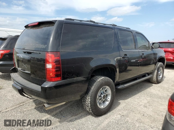2013 Chevrolet Suburban with VIN 1GNWKMEG4DR257785, listed as a Copart auction lot 76817344 with 68,021 mi miles and Salvage title. Bid and sale history available at DreamBid. Image 3.