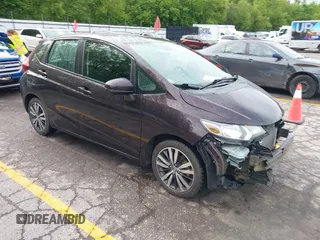 2015 Honda Fit EX-L z VIN 3HGGK5H83FM765758, wystawiony jako IAAI lot #42320312 z przebiegiem 63 122 mil mil oraz . Historia ofert i sprzedaży dostępna na DreamBid. Obrazek 1.