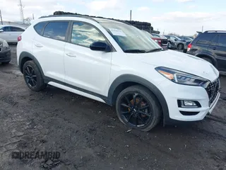 2019 Hyundai Tucson Ultimate with VIN KM8J3CAL2KU949093, listed as a IAAI auction lot 41446521 with 58,446 mi miles. Bid and sale history available at carsss.com. Image 1.