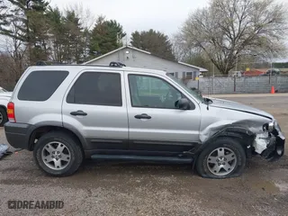 2005 Ford Escape XLT with VIN 1FMYU93125KD27166, listed as a IAAI auction lot 41892715 with 59,067 mi miles. Bid and sale history available at carsss.com. Image 14.