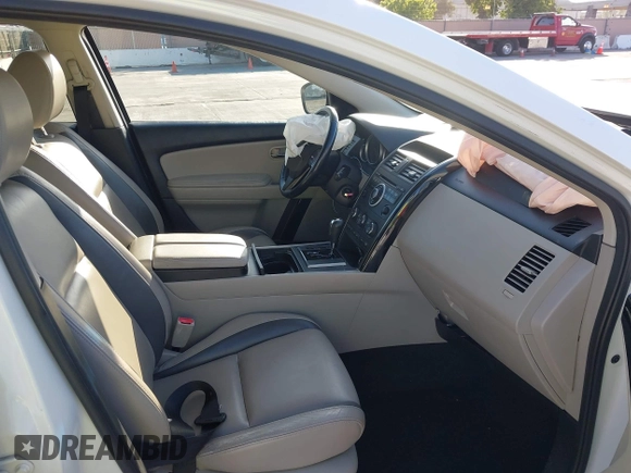 2012 Mazda CX-9 Touring z VIN JM3TB3CVXC0338761, wystawiony jako IAAI lot #42386603 z przebiegiem 166 217 mil mil oraz . Historia ofert i sprzedaży dostępna na DreamBid. Obrazek 5.