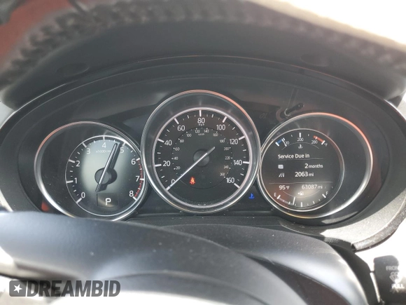 2019 Mazda CX-9 Touring with VIN JM3TCACY7K0327632, listed as a Copart auction lot 60798635 with 63,087 mi miles and Salvage title. Bid and sale history available at DreamBid. Image 9.