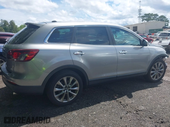 2014 Mazda CX-9 Grand Touring с VIN JM3TB2DA3E0443604, выставлен на аукционе IAAI как лот 42456552 с пробегом 150 053 миль миль и . История ставок и продаж доступна на DreamBid. Изображение 13.