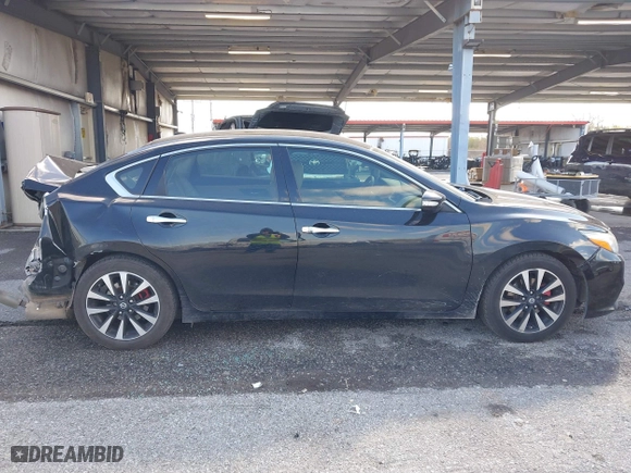 2018 Nissan Altima 2.5 SL with VIN 1N4AL3AP3JC156774, listed as a IAAI auction lot 41316010 with 164,647 mi miles. Bid and sale history available at carsss.com. Image 13.