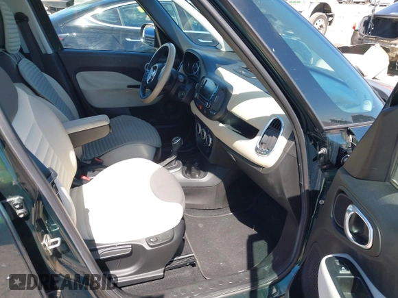 2014 FIAT 500L Easy with VIN ZFBCFABH1EZ001958, listed as a IAAI auction lot 42220010 with 62,450 mi miles and . Bid and sale history available at DreamBid. Image 5.