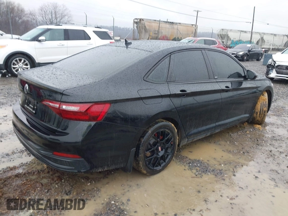 2023 Volkswagen Jetta Sport z VIN 3VWBM7BU2PM028974, wystawiony jako IAAI lot #41547698 z przebiegiem 30 061 mil mil oraz . Historia ofert i sprzedaży dostępna na DreamBid. Obrazek 4.