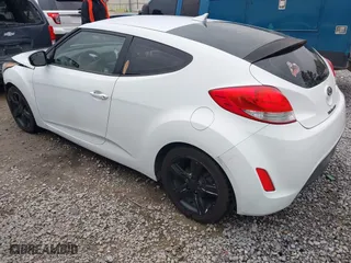 2014 Hyundai Veloster with VIN KMHTC6AD7EU217470, listed as a IAAI auction lot 41286296 with 150,034 mi miles. Bid and sale history available at carsss.com. Image 3.