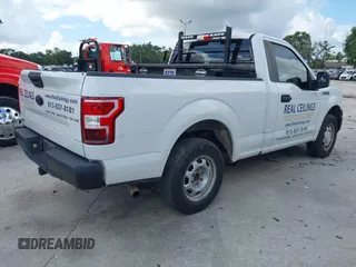 2018 Ford F-150 XL with VIN 1FTMF1CB0JFE21234, listed as a IAAI auction lot 42605399 with 243,035 mi miles and . Bid and sale history available at DreamBid. Image 4.