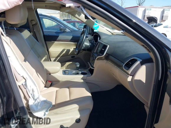 2014 Jeep Grand Cherokee Limited with VIN 1C4RJFBT3EC195354, listed as a IAAI auction lot 42031013 with 168,304 mi miles and . Bid and sale history available at DreamBid. Image 5.
