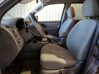 2006 Ford Escape XLT with VIN 1FMYU93136KB47339, listed as a Copart auction lot 77029434 with 76,101 mi miles and Salvage Title. Bid and sale history available at carsss.com. Image 7.